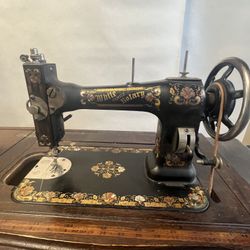 White Family Rotary Sewing Machine #35 (treadle) In Cabinet