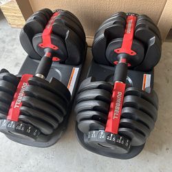 New pair of 52lb/ 24kg  adjustable dumbbells. 105lb/ 48kg in total $200