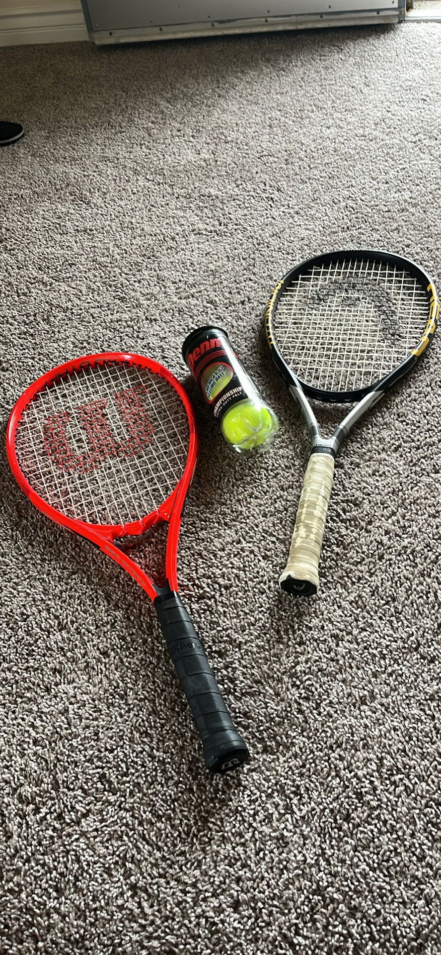 Tennis Rackets And New Balls