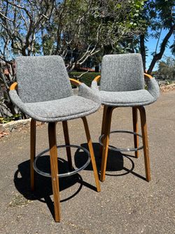 Pair of swivel chairs