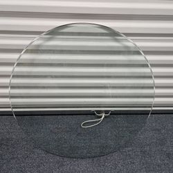 30" diameter glass table top....1/2" thick. 
