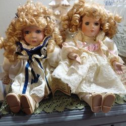 Vintage Porcelain wind- up Musical Dolls - Brand New- $35  for both