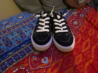 Black and white slip on canvas sneakers