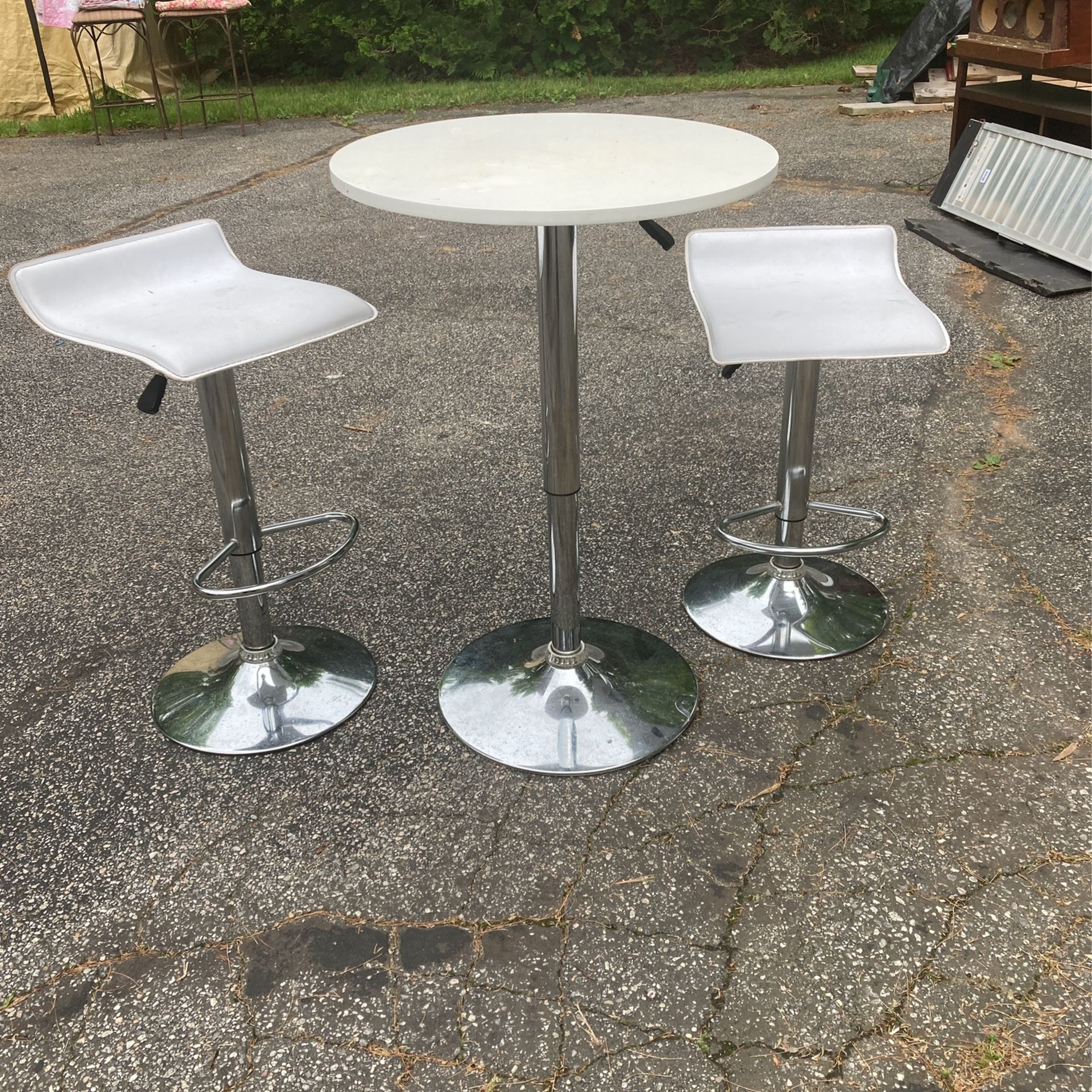 Adjustable Table And 2 Adjustable Stools