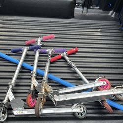 4 Razor scooters
