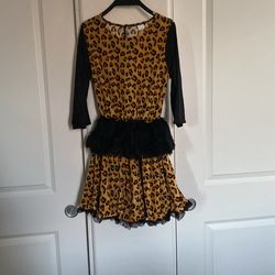 New Xtinmee Halloween Cheetah Costume , Size Med (8/10) Girls Taken Out Of Bag For Picture , Only Has Dress Hair Band With Ears  And 2 Bows , See Pics