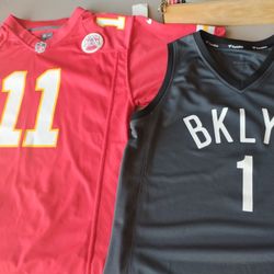 $19 OBO (2) boys Jerseys Football Basketball Nike NFL Smith Russell