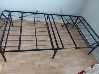 2 Amazon  Basics twin beds frames. $50 ea. Or  $90 both,  together