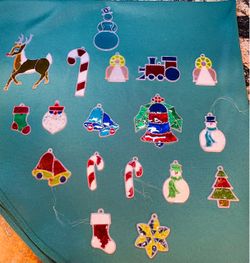 Pretty collection of vintage faux stained glass Christmas ornaments/suncatchers
