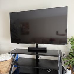 Onn Roku Smart TV 65” + TV Stand