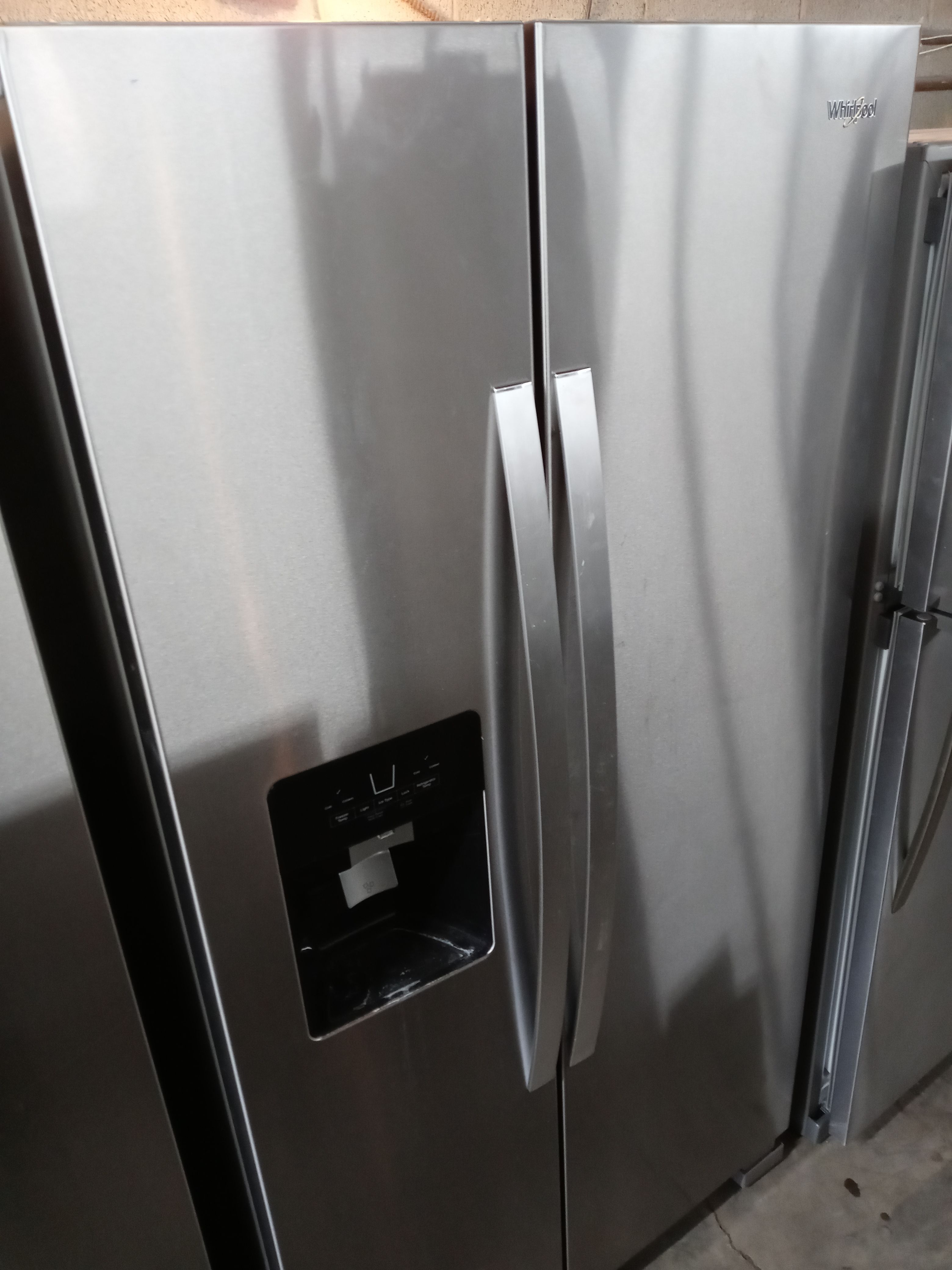 Whirlpool stainless steel side by side refrigerator - Free delivery