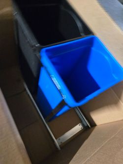 Sliding trash bins