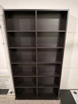 Two adjustable book/accessory/dvd racks