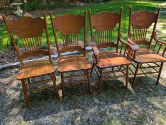 Vintage Amish oak pressed back chairs