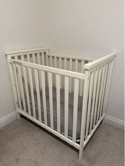 Delta Mini Crib w/ Serta Mattress - White
