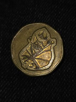 Decorative Coin or Token with Engraved Design