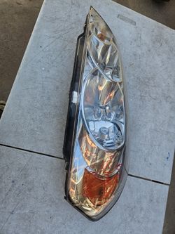 Chevy Impala left headlight