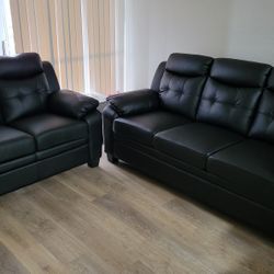 Sleek Black Sofa And Loveseat