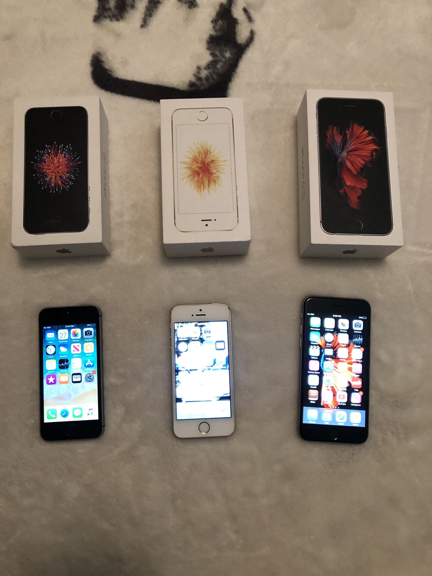 iPhone SE (White, $100) iPhone SE (Black $100)
