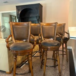 Set  0f four Hooke  Swivel Bar stool 