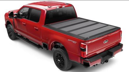 💝 Super Duty 2017-2026 Hard Folding Between the Bedrails Truck Bed Cover by RealTruck Advantage® For 8' Styleside Bed