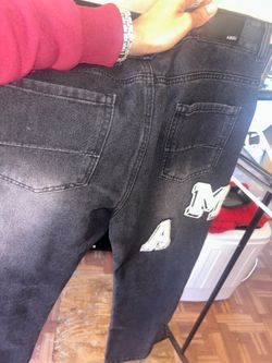 Amiri Jeans with Cotton Lettering.