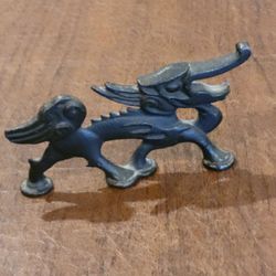 Vintage Kirin  bottle opener Japanese Nambu-Tekki craft Mythical Animal 
Dragon.
It is crafted from black cast iron using traditional Japanese 
Nambu-