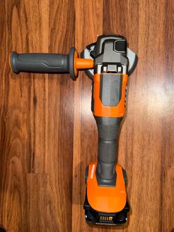 RIDGID 18V Brushless 4-1/2” angle grinder with a 4.0Ah MAX Output battery
