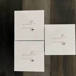 White Earbuds Wireless Charging
