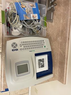 Welch Allyn CP 100 Resting ECG/EKG Machine with leads, cables, and accessories included.
