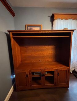 FREE!! Beautiful wood TV stand with cabinets and a shelf