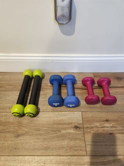 Sets of workout weights: 5lbs, 3lbs and Zumba Toning Sticks (1lb).