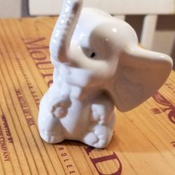 Porcelain Elephant With Raised Trunk Figurine

