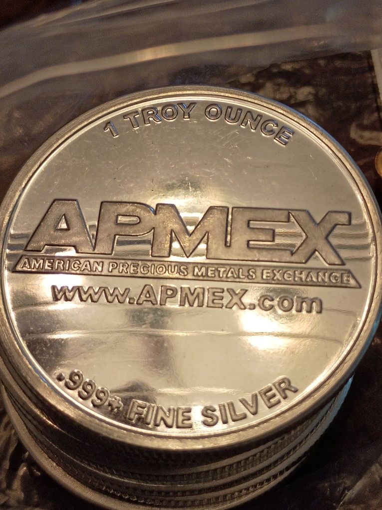 Silver Coins And Silver Bars 