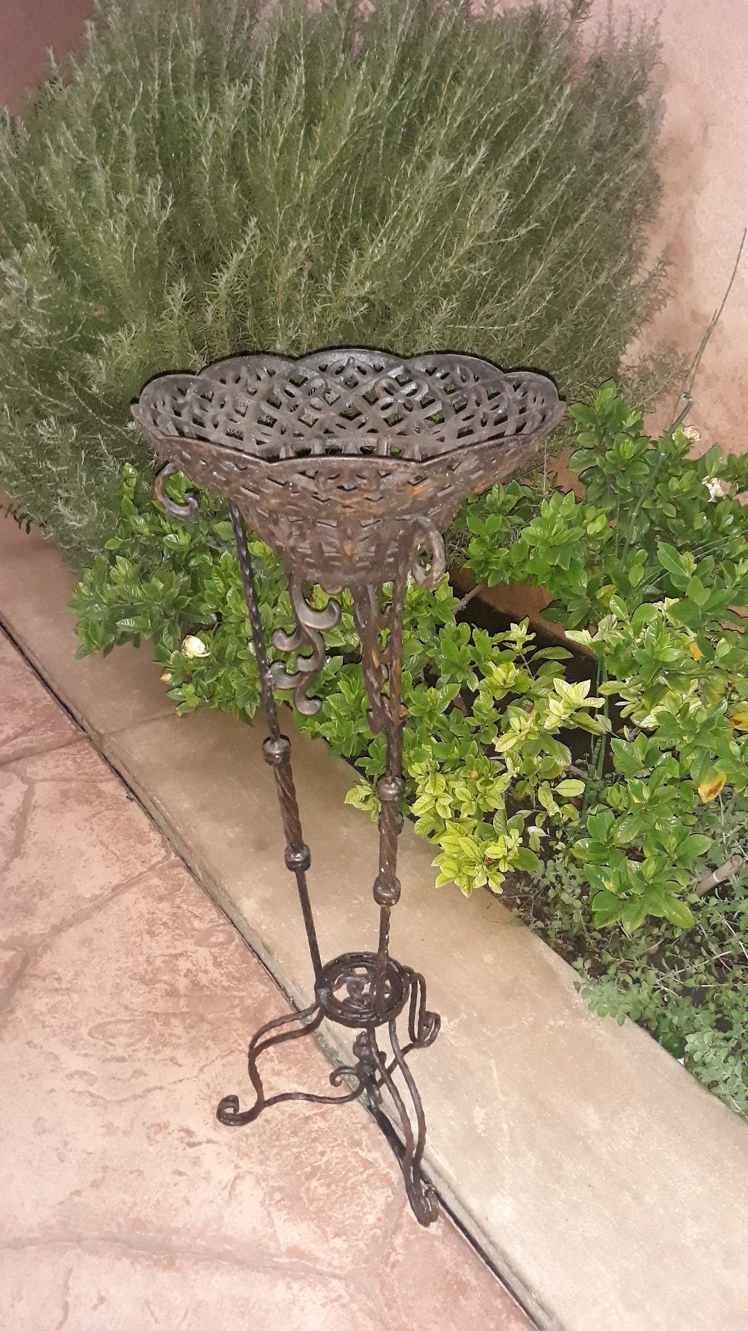 Cast iron plant holder.