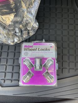 MCGARD 24215 Chrome Cone Seat Wheel Locks (M14 X 1.5 Thread Size) - Set of 4