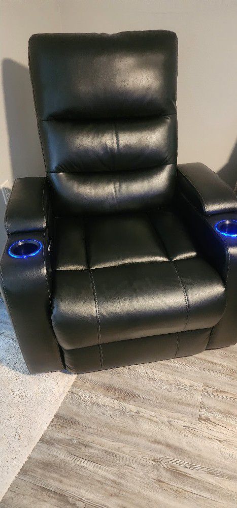 Two Matching Like New Serta Leather Recliners  400 Each