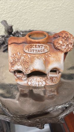 Swagman pottery scent cottage, a decorative ceramic candle burner