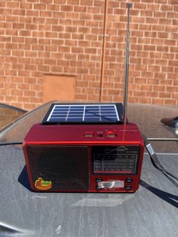 Solar Radio With Blue Tooth Connectivity And Outlet For Phone Charging