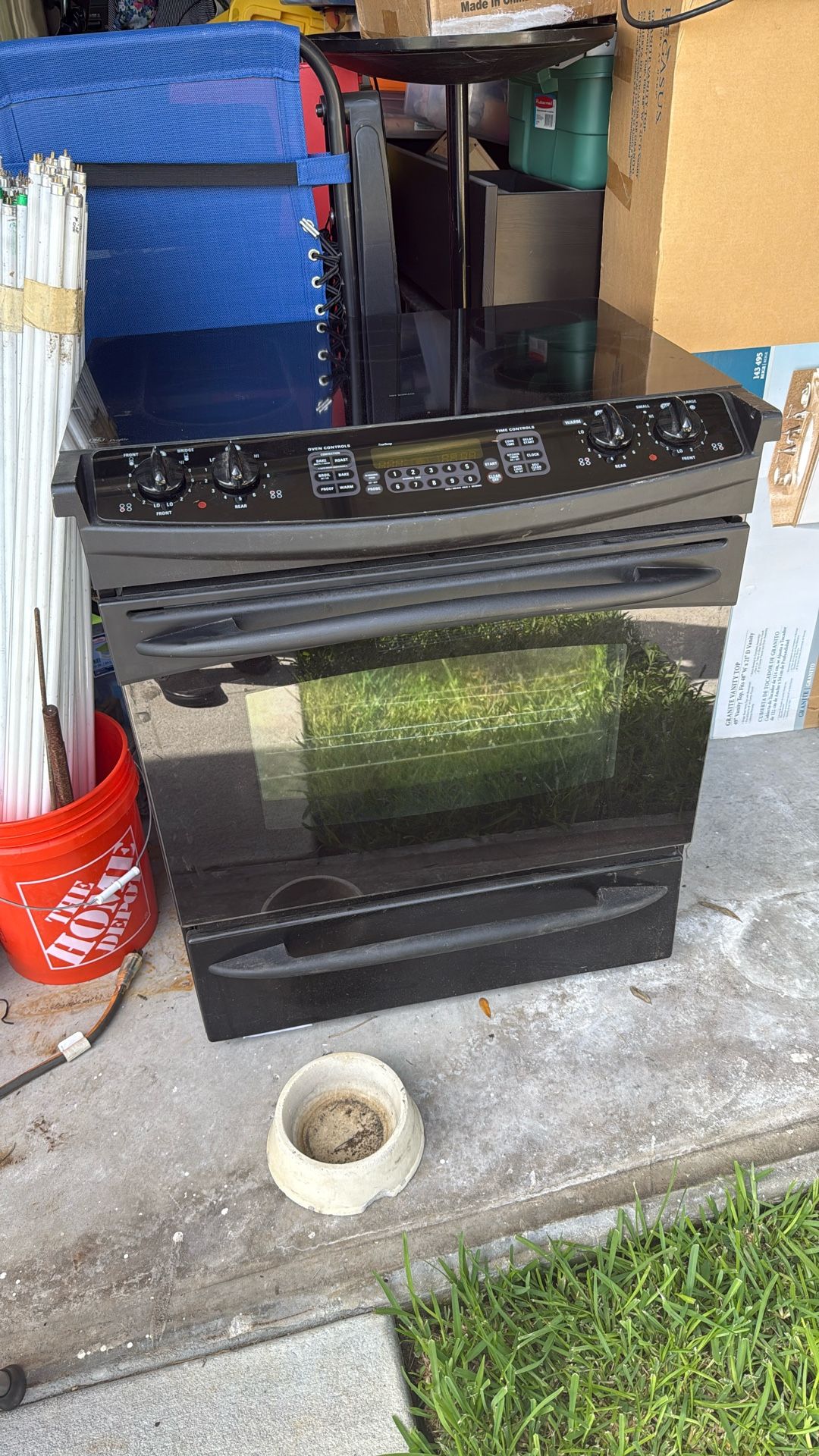 GE Profile Black Slide Glass Top Range