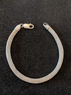 $30. Unique sterling bracelet marked Italy 925. 7.5 in.