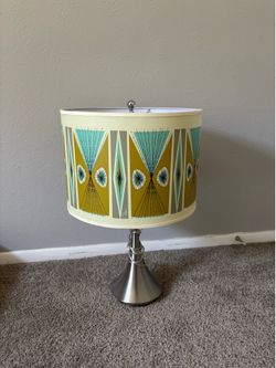The Ragnar Vernaculis III table lamp