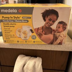 NIB Medela Pump/pads