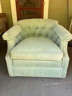 Turquoise swivel chair