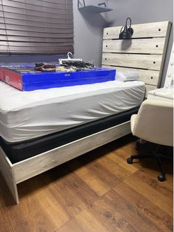 Bed w/ mattress and mattress protector