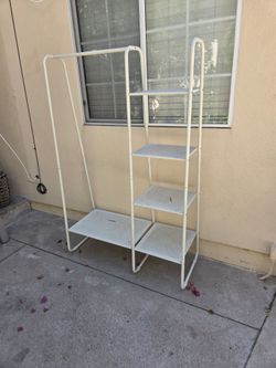 White Metal Shelving Unit with Clothing Rack