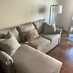 Gray Couch  With Chaise And Storage Space