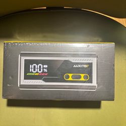 AUXITO portable car battery jump starter / charger.