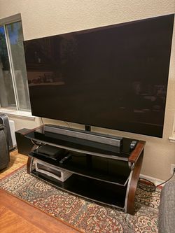 Swivel TV Stand with Mount and brackets for 32-77 Inch TVs