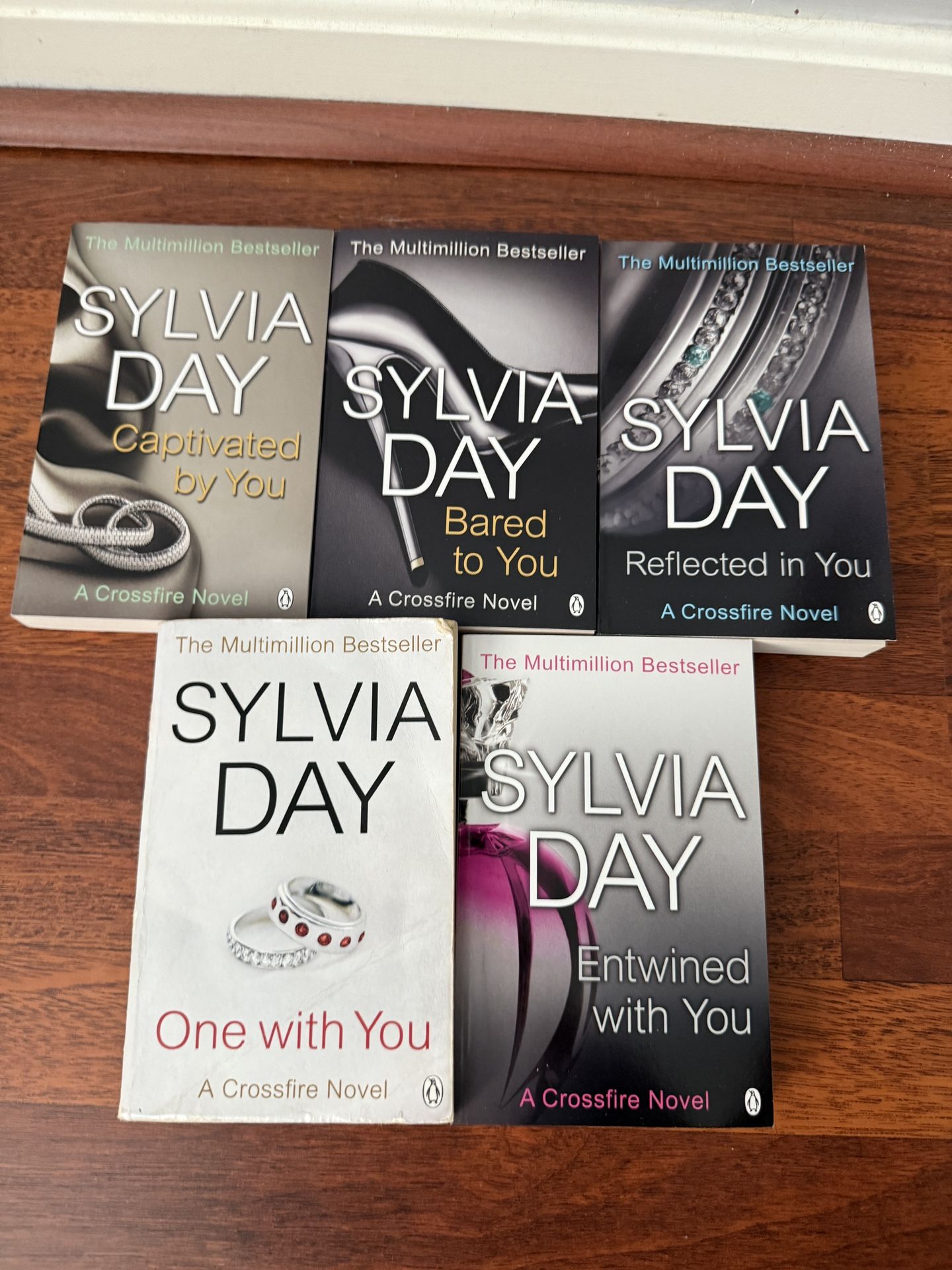 A Crossfire Novel 5-Book Bundle! Only one book has been used, the other 4 books are new!
